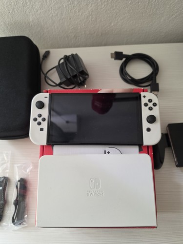 Nintendo switch oled 64gb - nintendo,