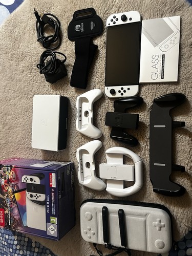Nintendo switch oled 64gb - nintendo,