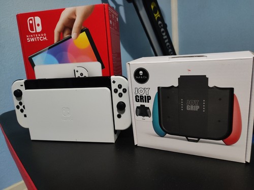 Nintendo switch oled 64gb - nintendo,